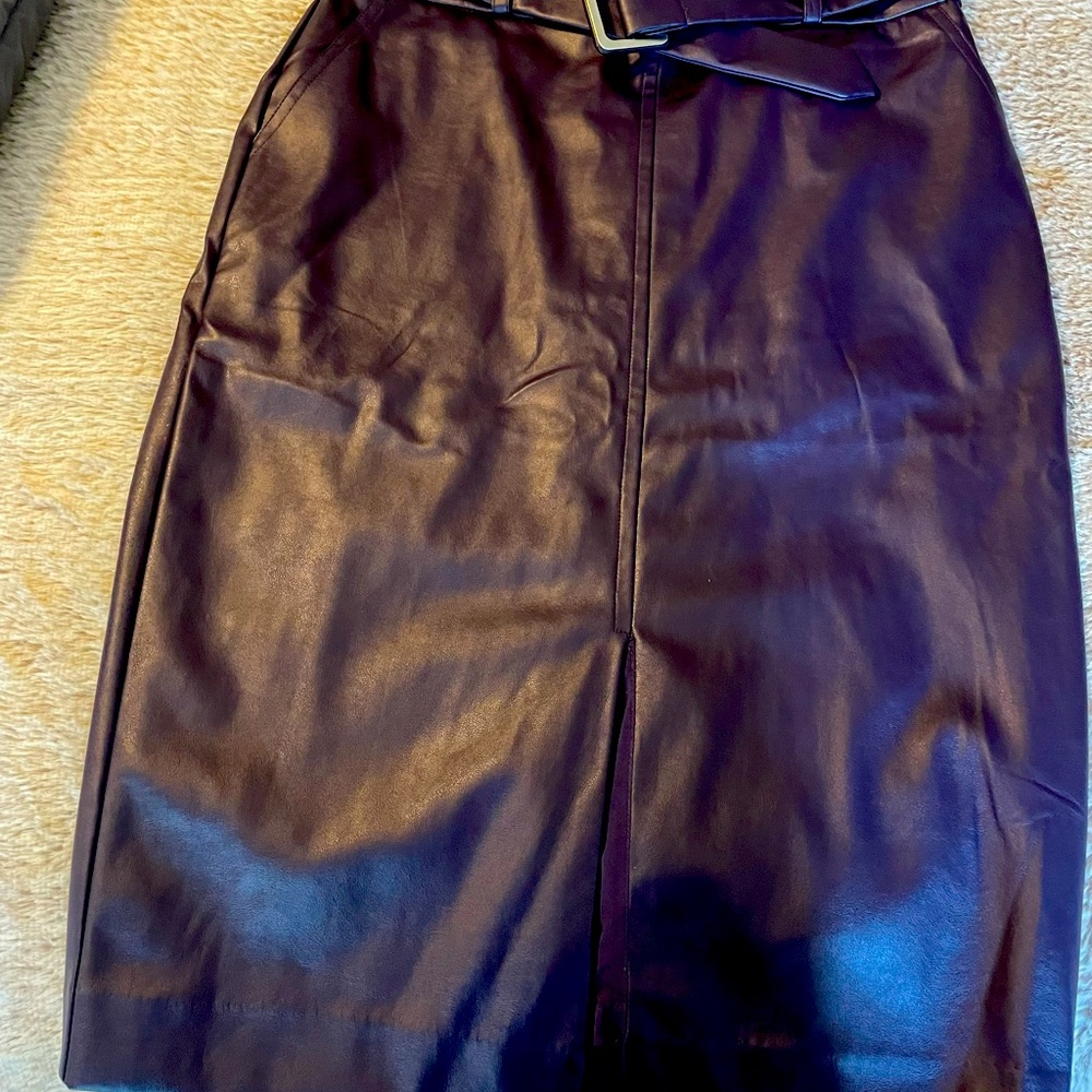 NY&C Vegan Leather skirt. Purple with split in the front-belted.  NWT